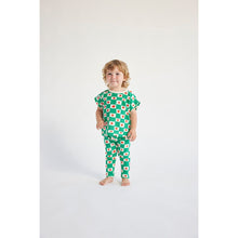 Load image into Gallery viewer, Bobo Choses - green check baby leggings with tomato print

