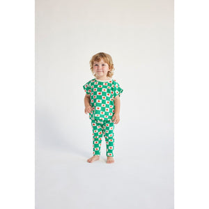 Bobo Choses - green check baby leggings with tomato print