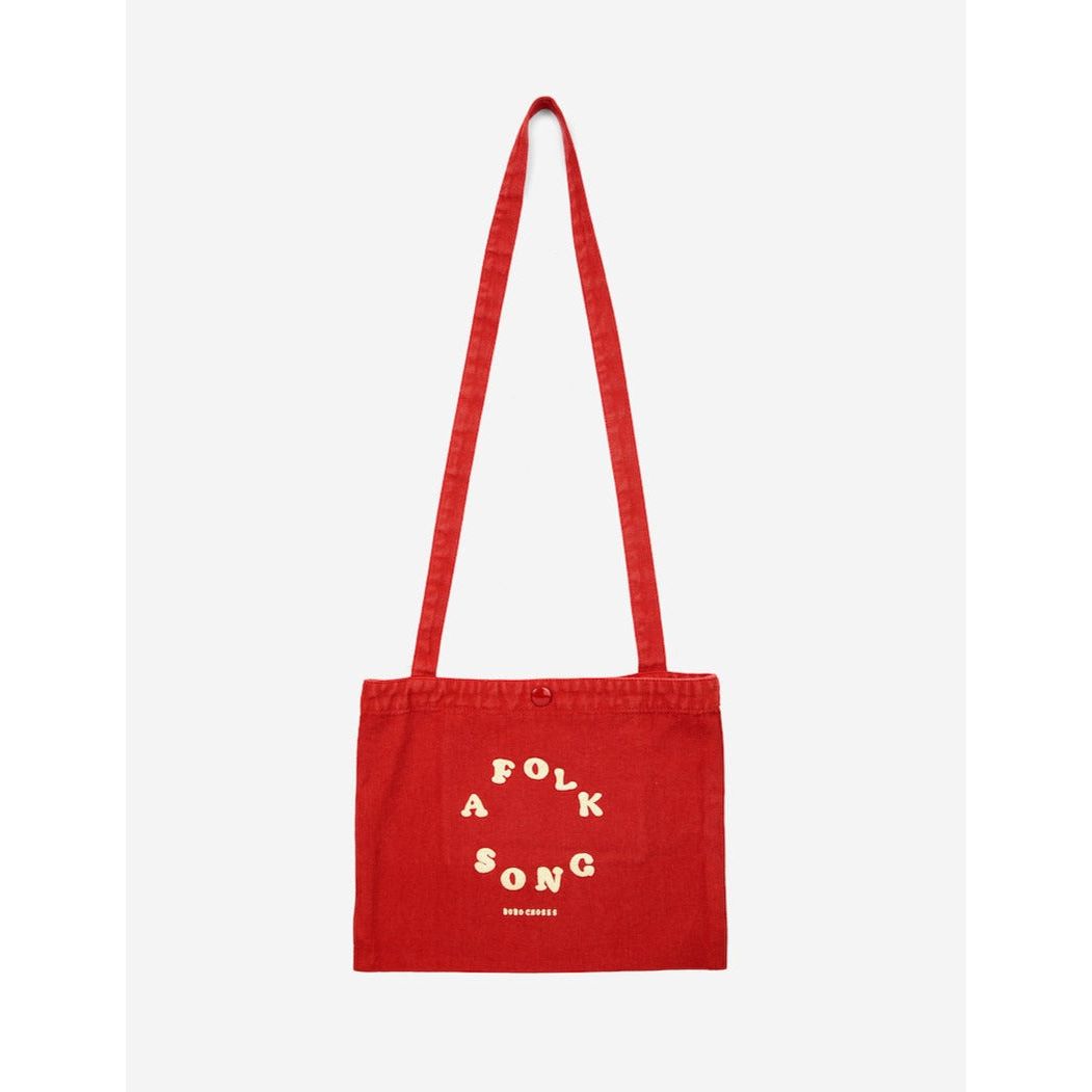 Bobo Choses - Red messenger canvas bag with 'A folk song' print