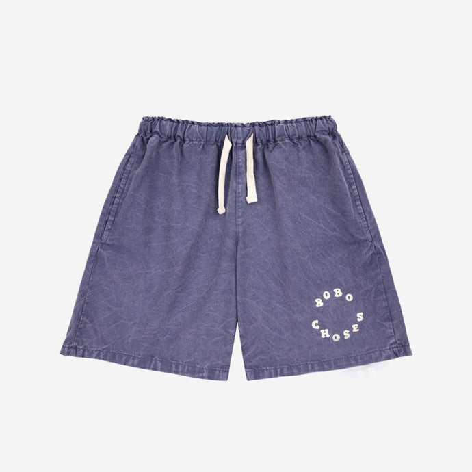 Bobo Choses - dark washed blue woven shorts with circle logo on leg