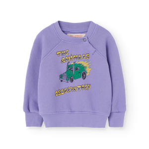 The Animals Observatory purple baby sweatshirt with green truck print from the new FW24 collection.