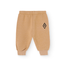 Load image into Gallery viewer, The Animals Observatory soft brown baby sweatpants with black logo print from the new FW24 collection.
