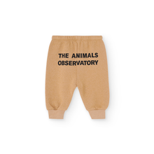 Load image into Gallery viewer, The Animals Observatory soft brown baby sweatpants with black logo print from the new FW24 collection.
