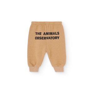 The Animals Observatory soft brown baby sweatpants with black logo print from the new FW24 collection.