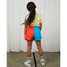 Load image into Gallery viewer, Mini Rodini two-tone woven shorts in red and blue 
