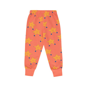 Tinycottons - papaya/ pale orange sweatpants with all over dancing stars print in yellow