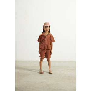 Weekend House Kids | Brown Cotton Terry Shirt with all over red logo print | Dear Jude