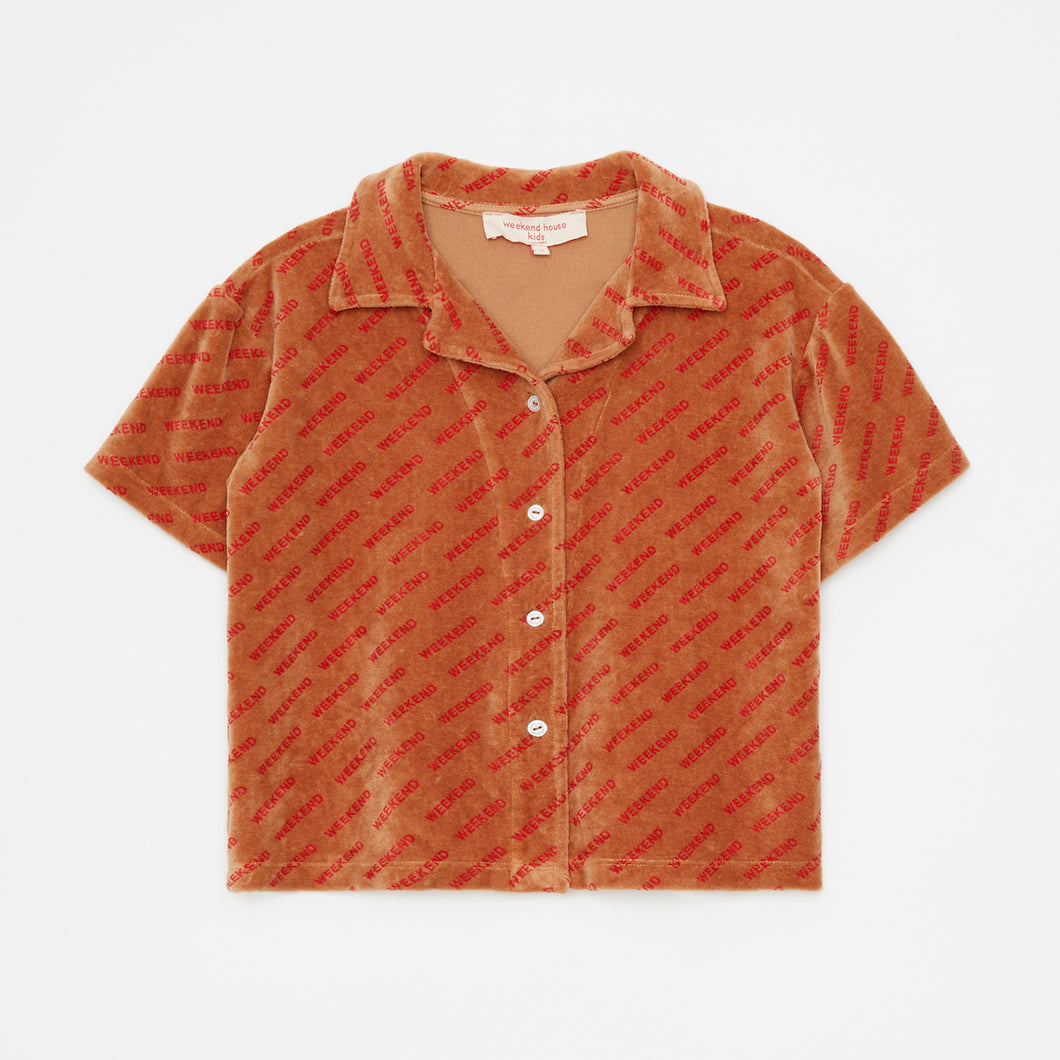 Weekend House Kids | Brown Cotton Terry Shirt with all over red logo print | Dear Jude